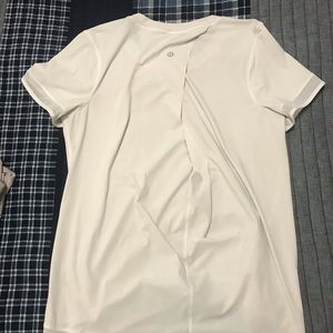 Lululemon white short sleeve w/ slight opened back